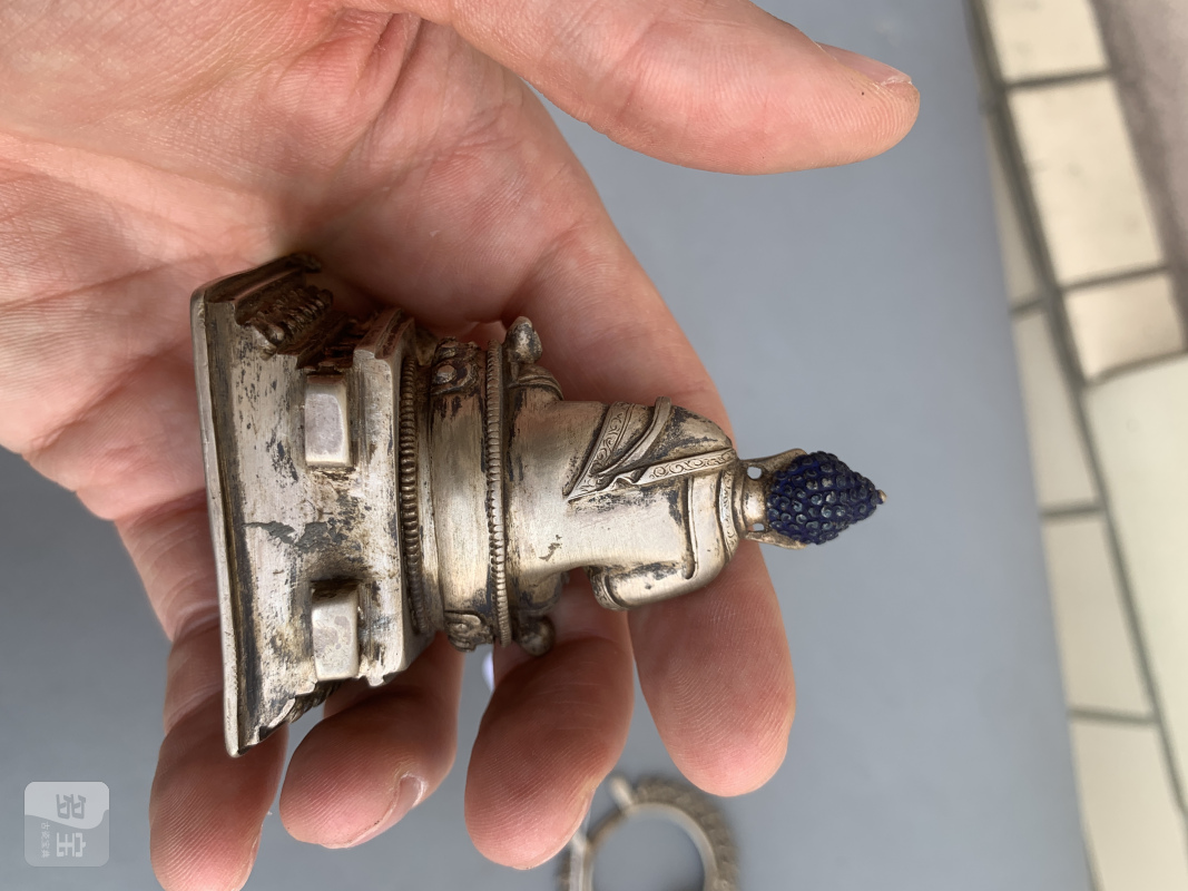 a silver figure of Buddha Shakyamuni - 图11